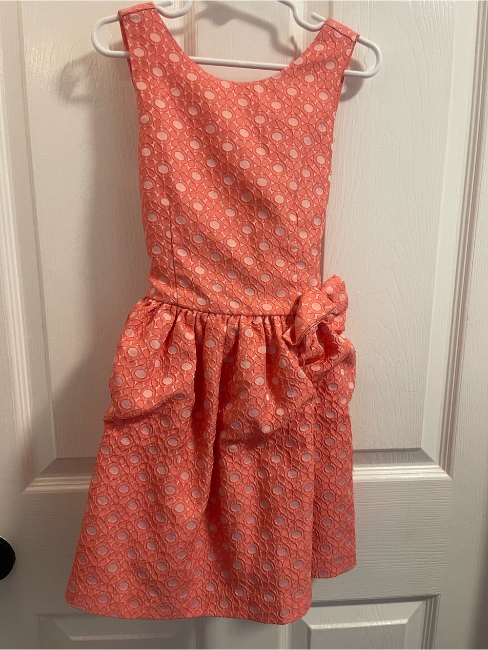Girls' Coral Sleeveless Party Dress with Side Bow Accent